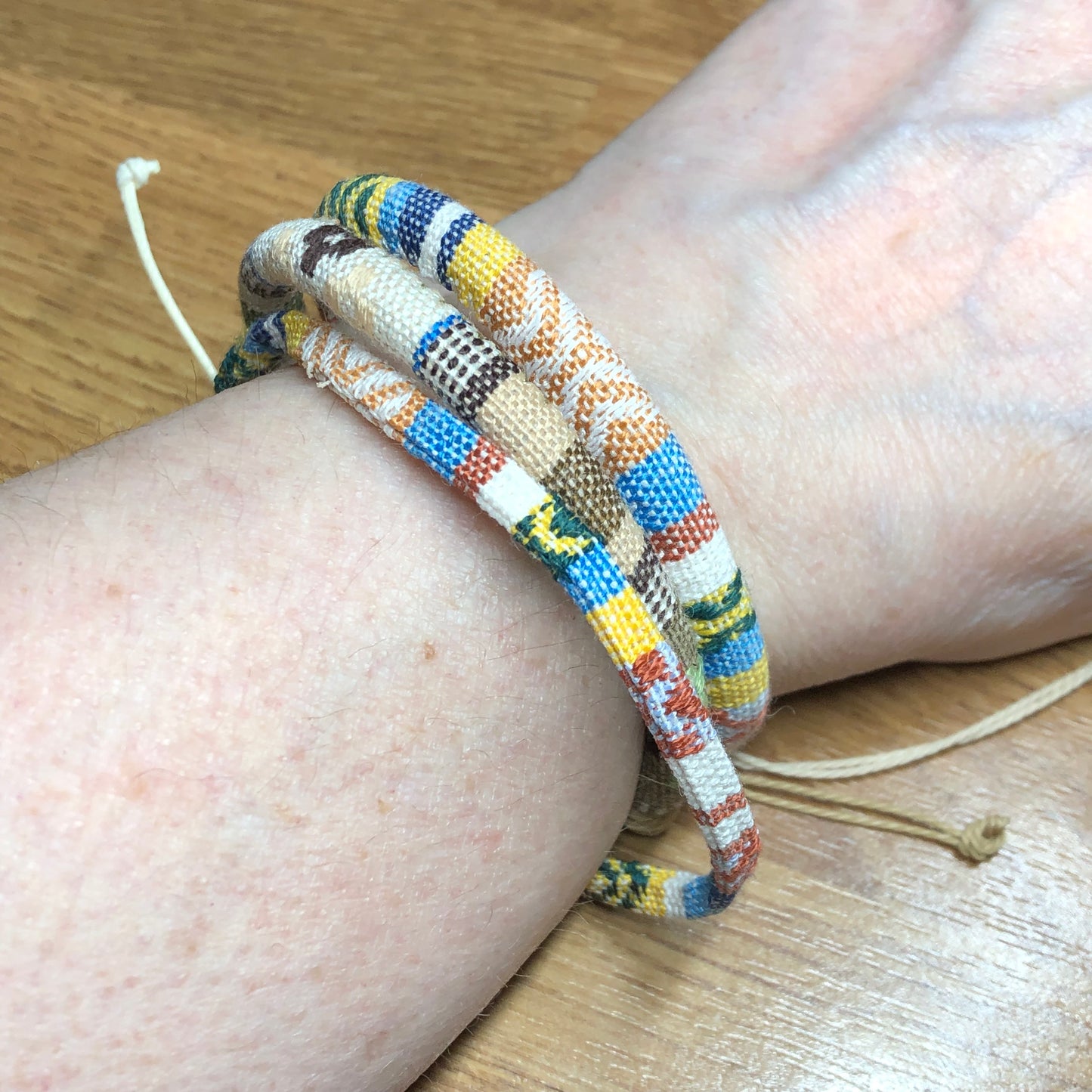 Three light handmade Bohemian cord braided woven stackable bracelets
