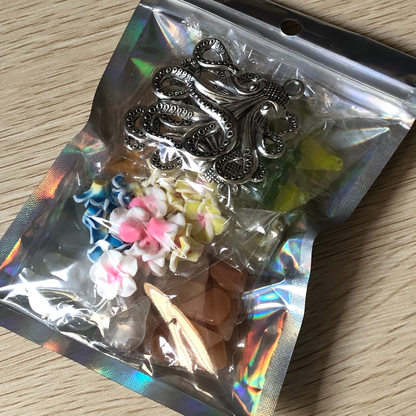 Bead and charm jewellery making bundle 15 with octopus charms and fimo flowers