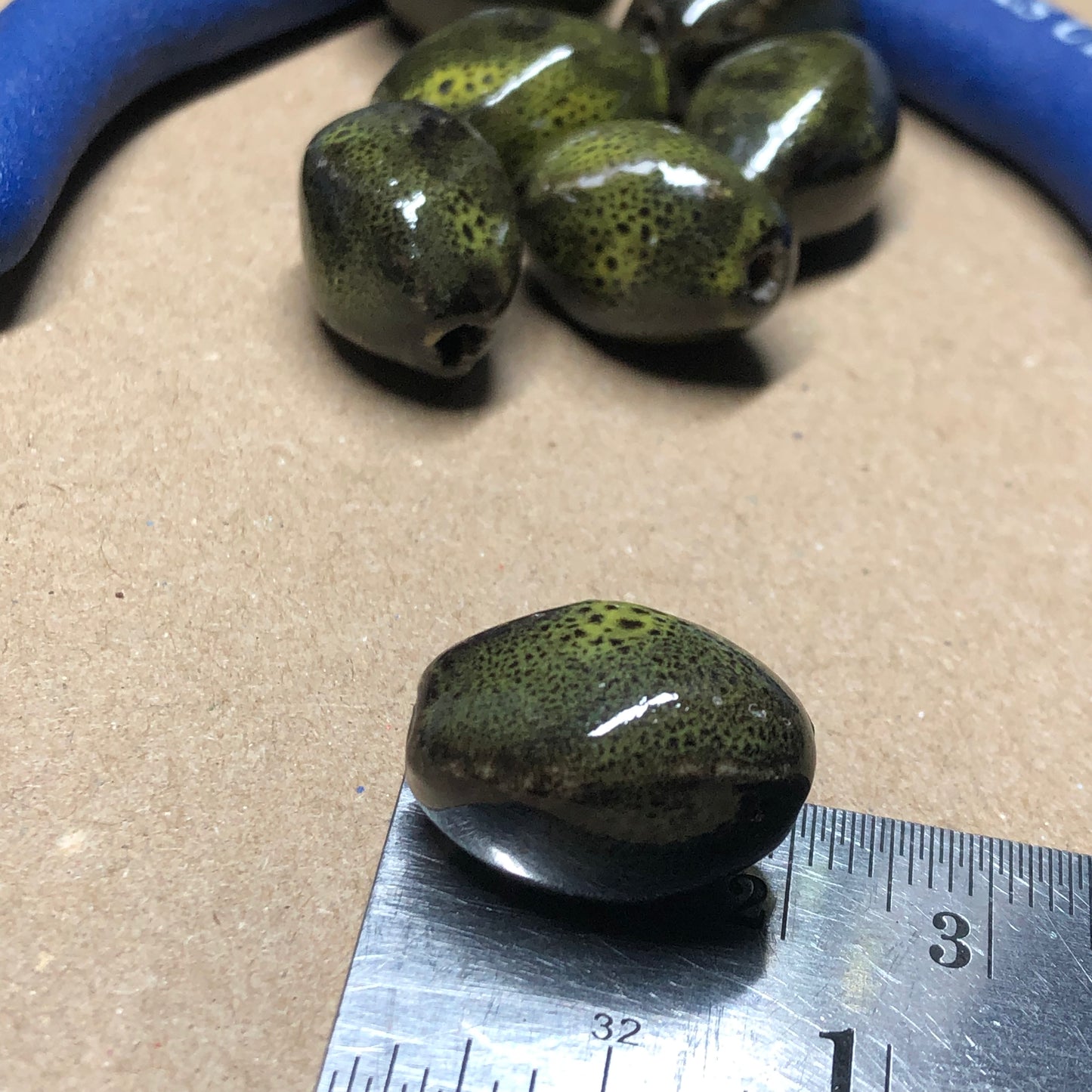 Green dragon egg clay beads