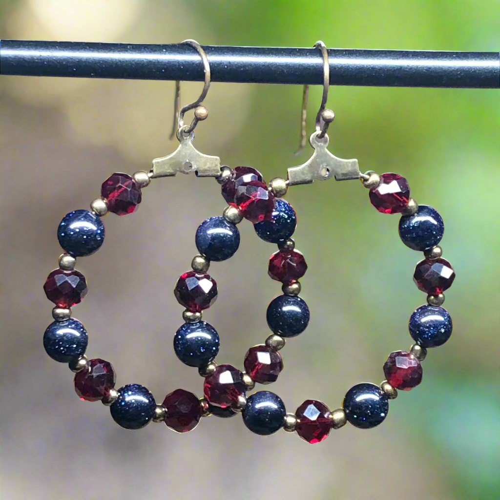 Suzanne - Goldstone and red crystal hoop earrings