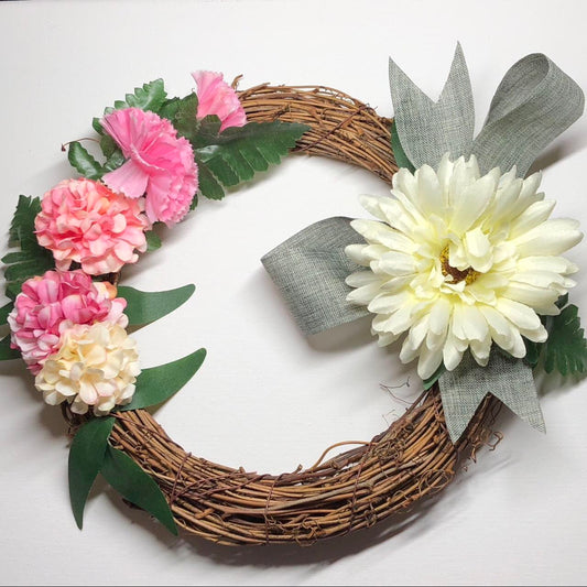 Willow cream floral hanging wreath decoration.