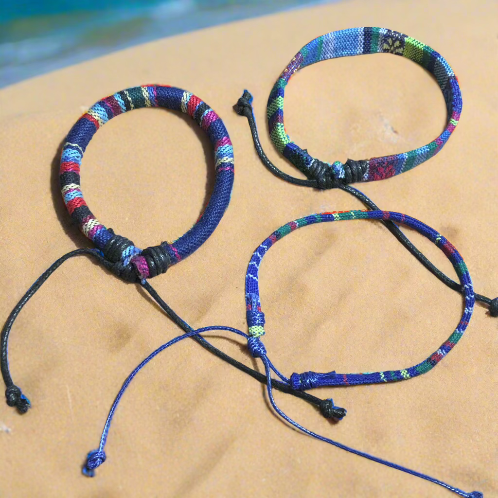 Three blue handmade multicolour string cord braided woven stackable bracelets