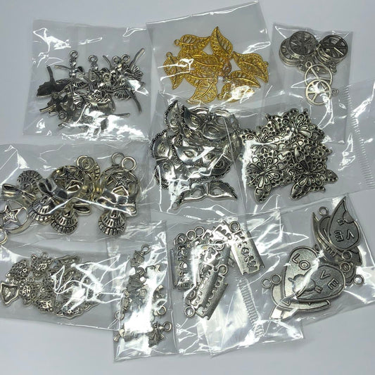 Ten mixed charm packs for jewellery makers
