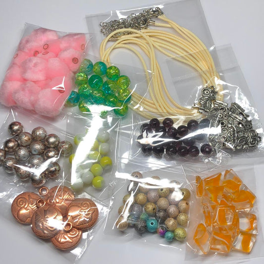 Ten colourful packs jewellery supplies