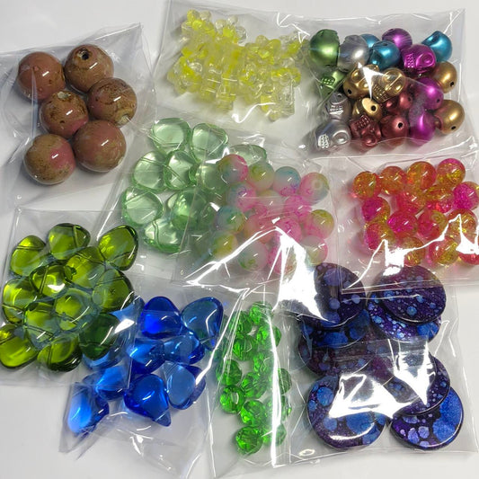 Ten mixed packs of beads for jewellery makers