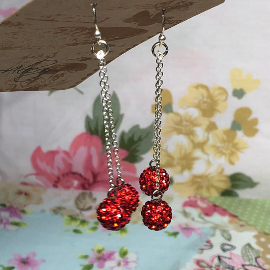 Silver earrings with red rhinestone shamballa beads