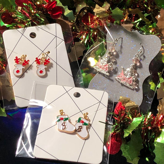 Three pairs Christmas earrings sleighs, boots and reindeer