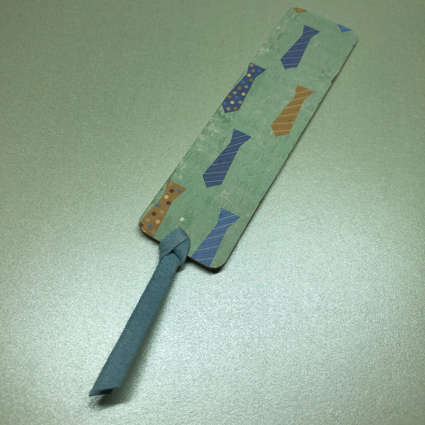 Masculine wooden bookmark with suede