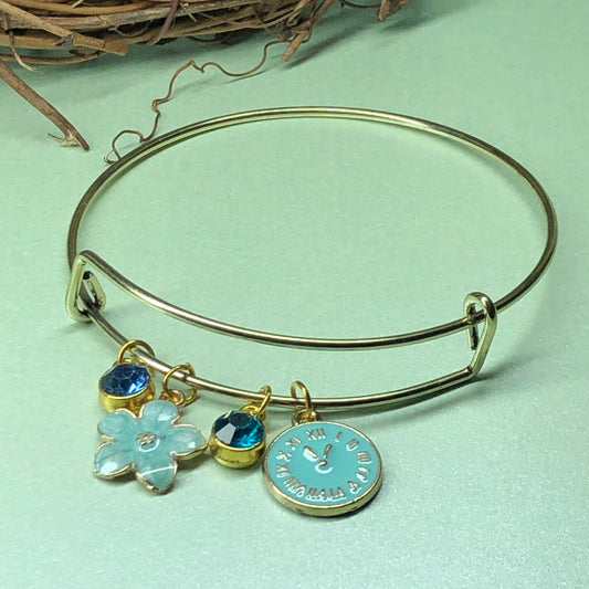 Blue clock and flower expandable bangle
