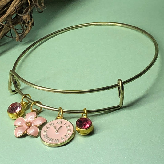Pink clock and flower expandable bangle