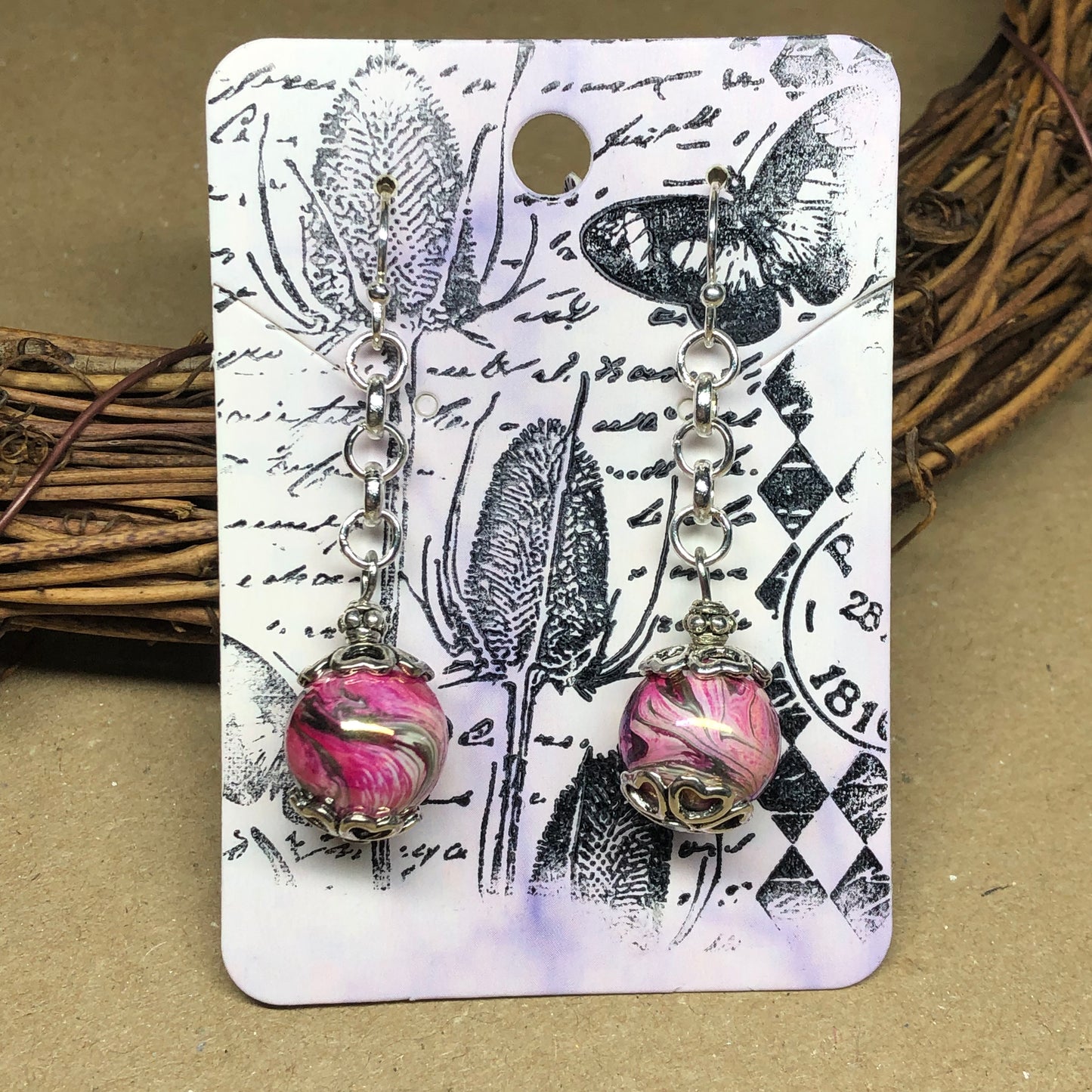 Vivienne - Pink swirl dangle earrings