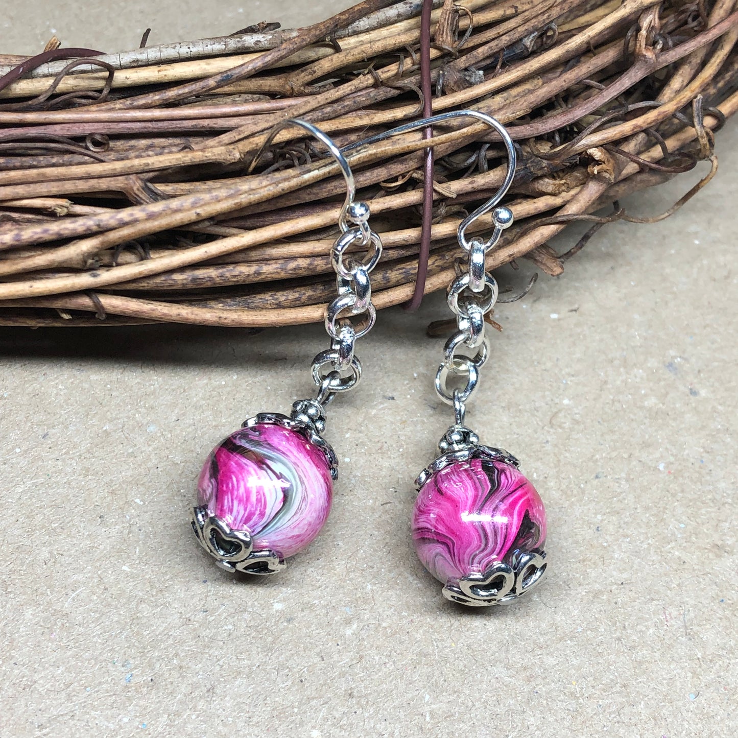 Vivienne - Pink swirl dangle earrings