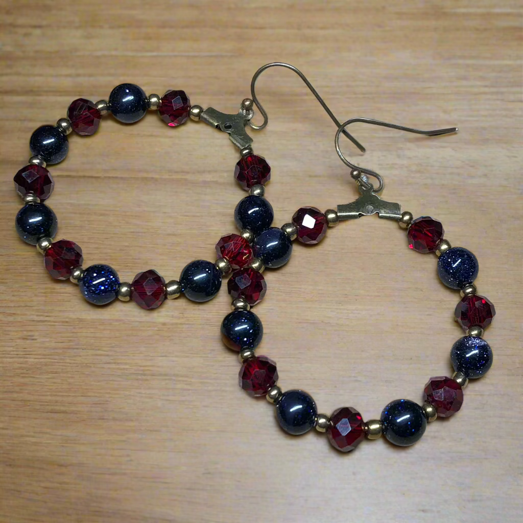 Suzanne - Goldstone and red crystal hoop earrings