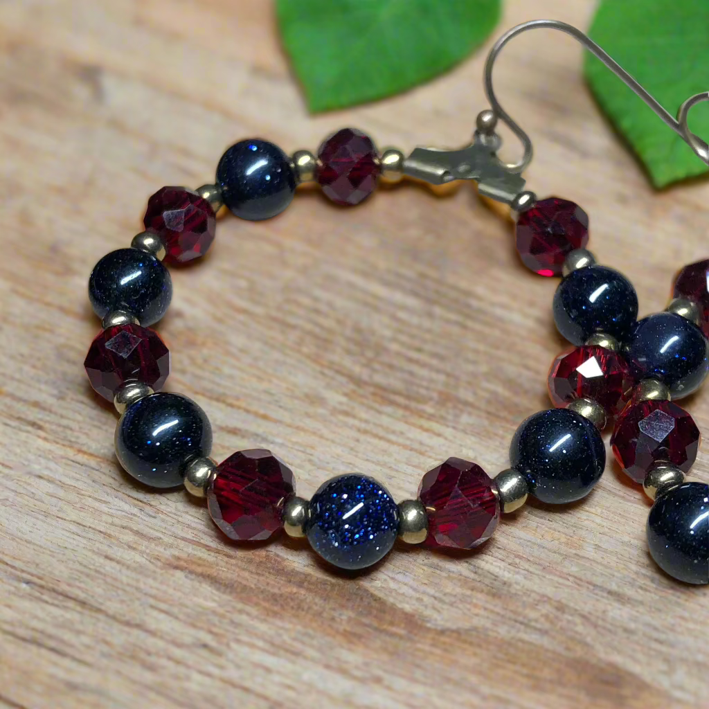 Suzanne - Goldstone and red crystal hoop earrings
