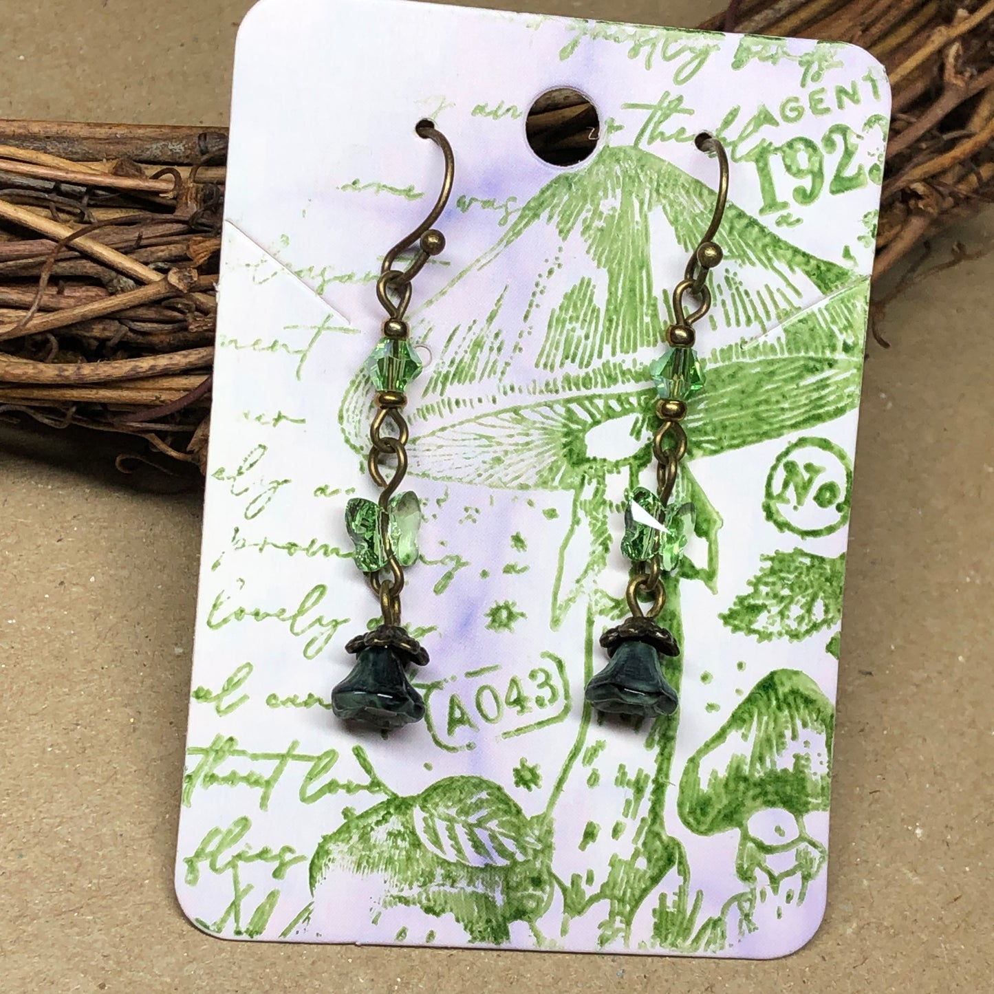 Aria - Crystal butterfly and Czech glass flower earrings