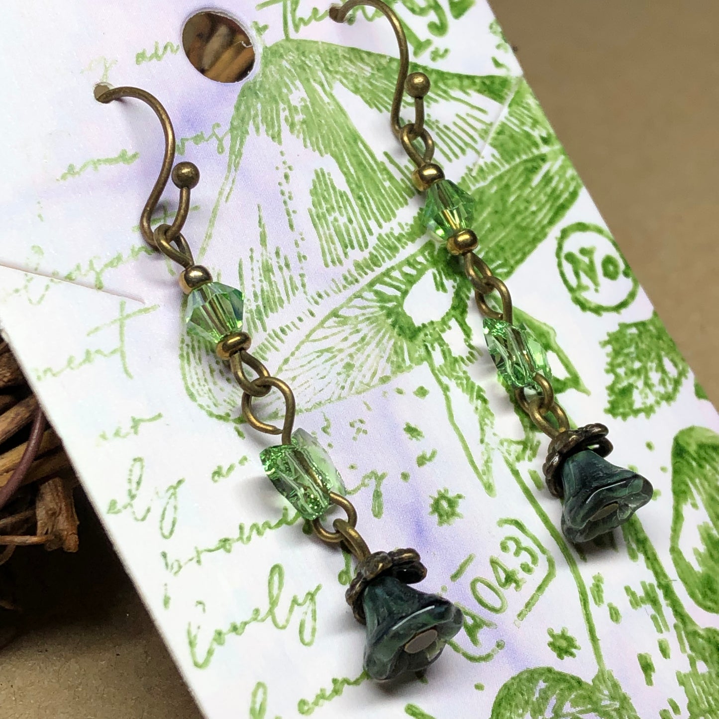 Aria - Crystal butterfly and Czech glass flower earrings
