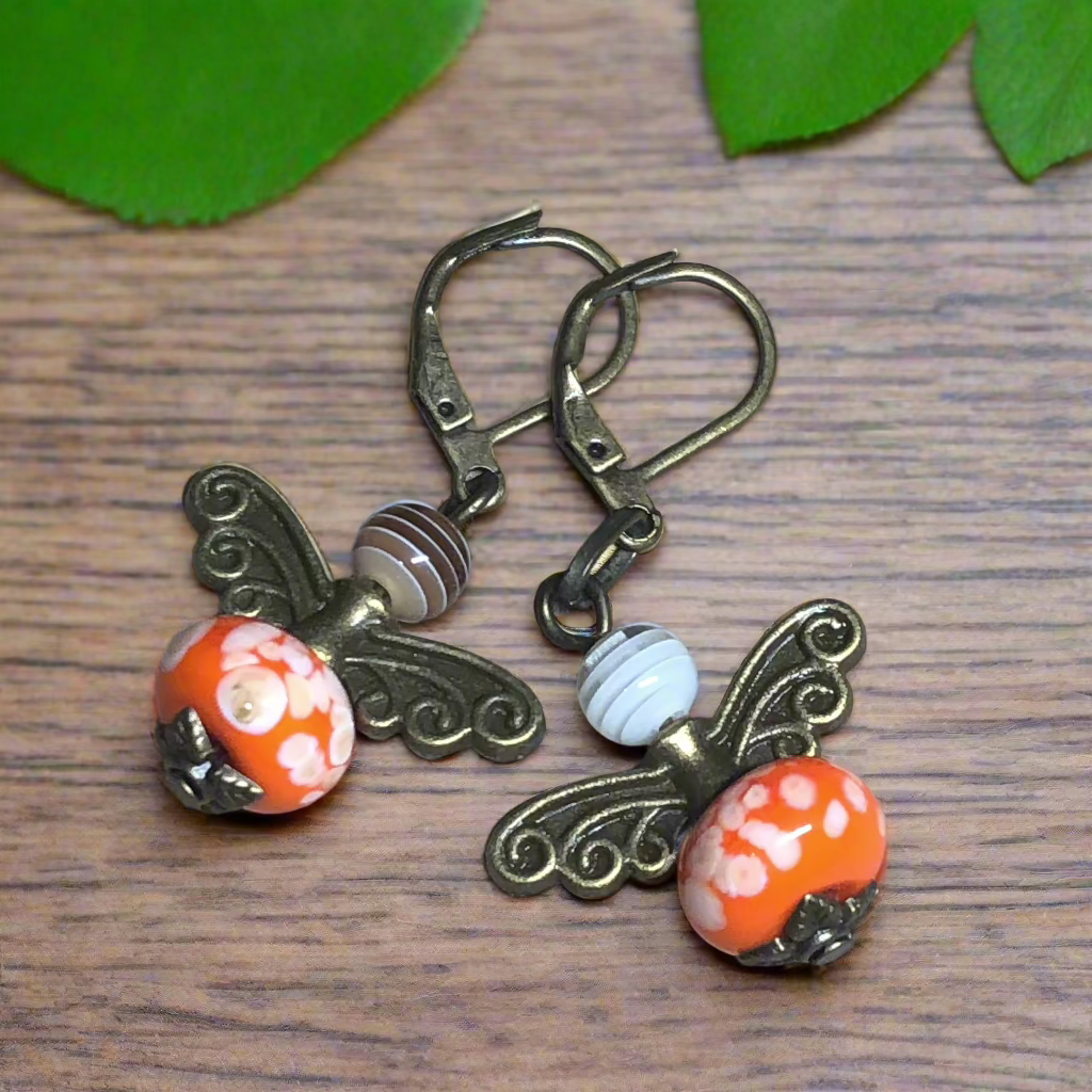 Ariadne - Orange glass bug bronze earrings