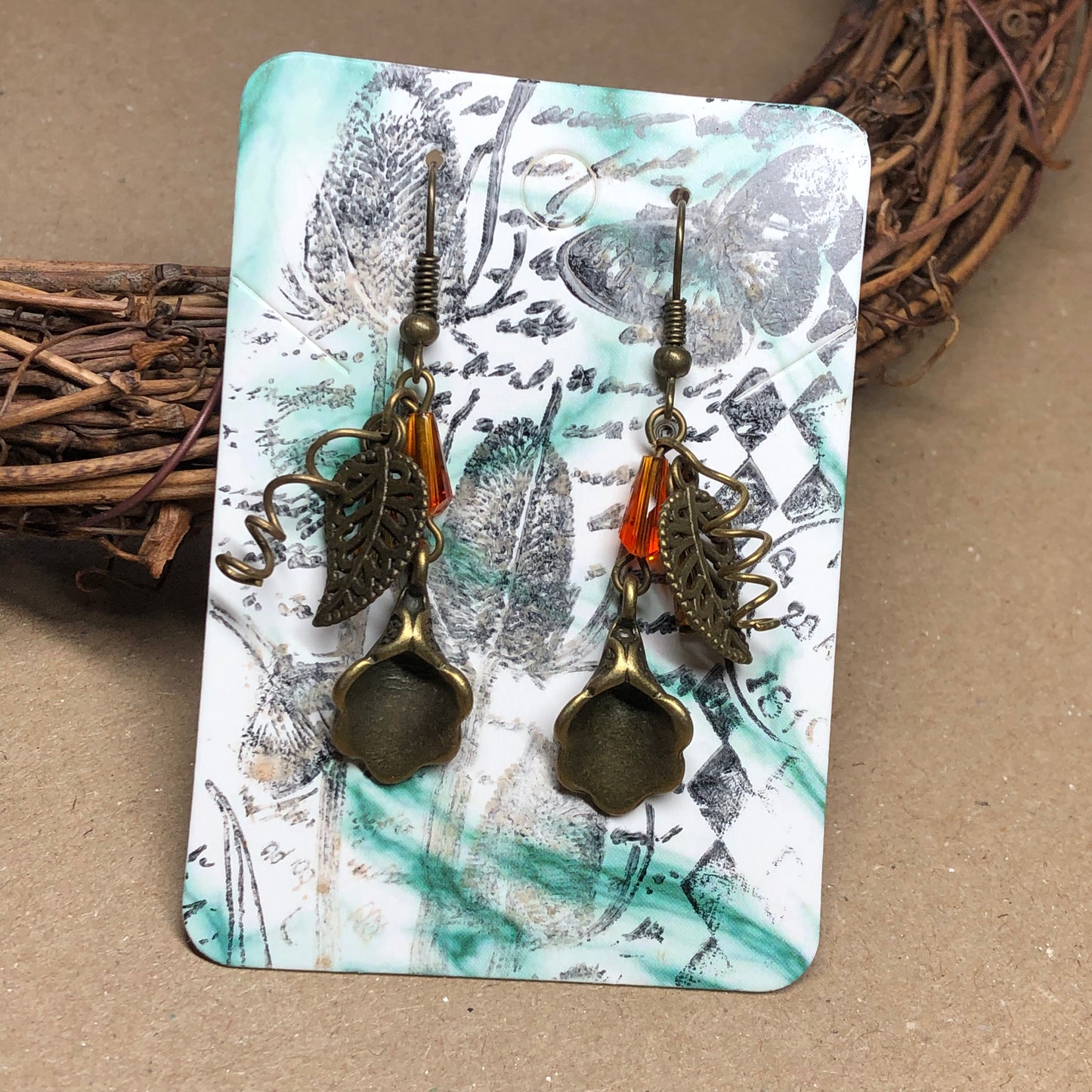Octavia - Fiery crystal bronze leaf earrings
