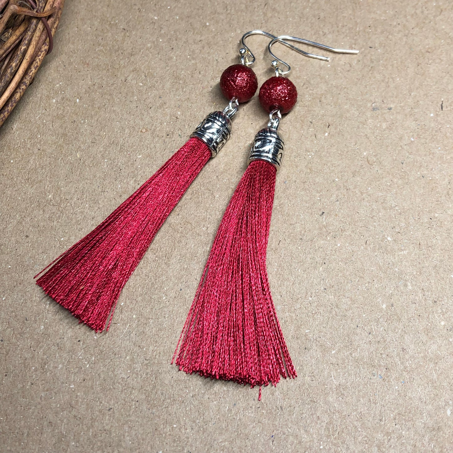 Raspberry tassel earrings with dewy beads