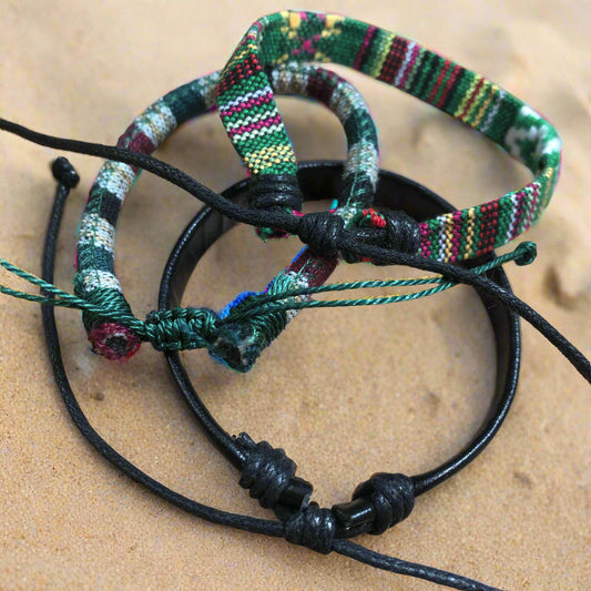 Three green handmade Bohemian cord braided woven stackable bracelets