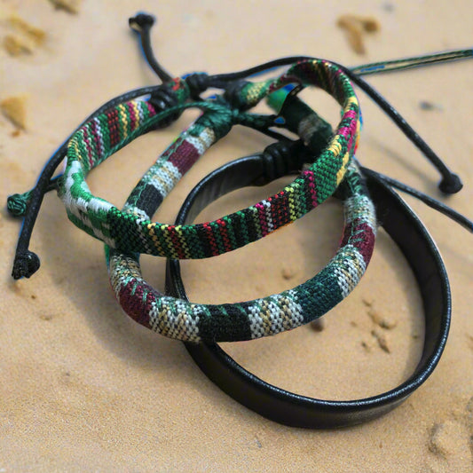 Three green handmade Bohemian cord braided woven stackable bracelets