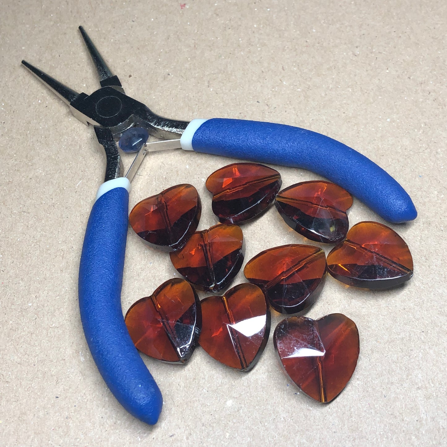 Brown heart shaped glass beads