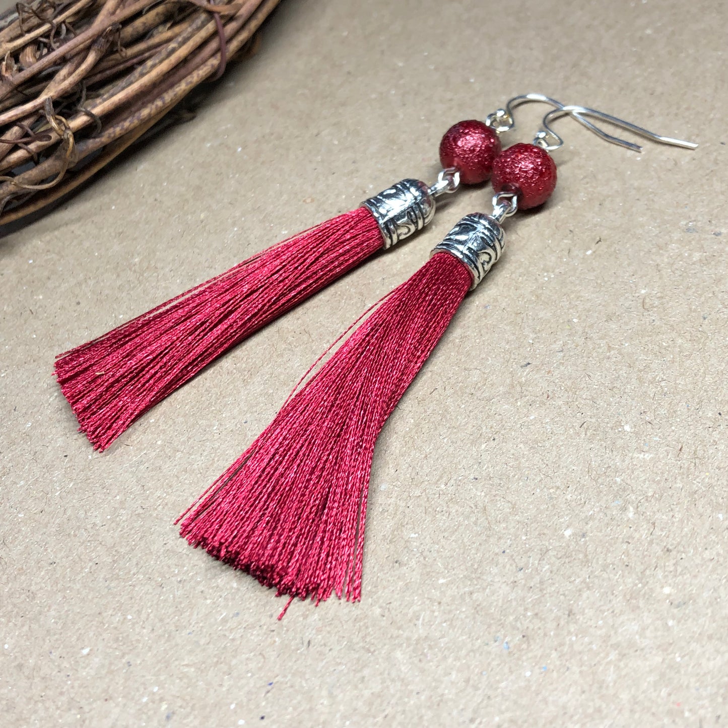 Raspberry tassel earrings with dewy beads