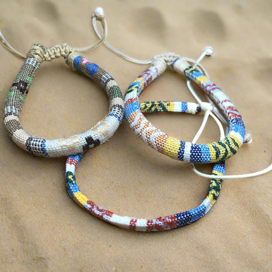Three light handmade Bohemian cord braided woven stackable bracelets