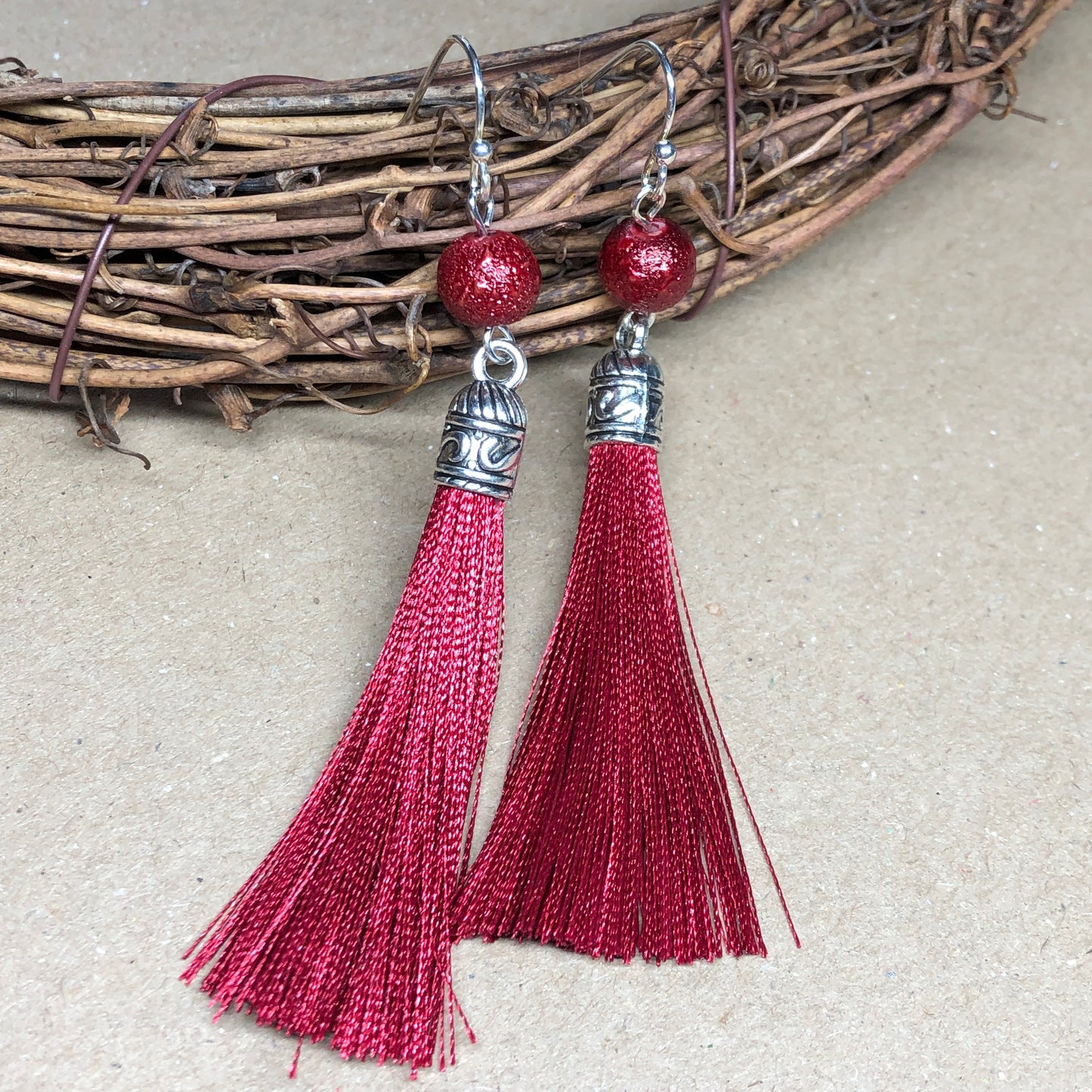 Raspberry tassel earrings with dewy beads