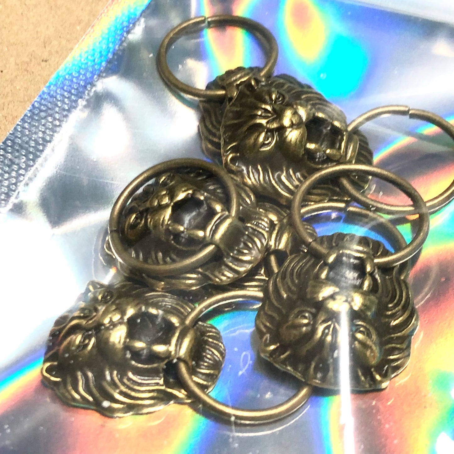 Six bronze doorknocker charms