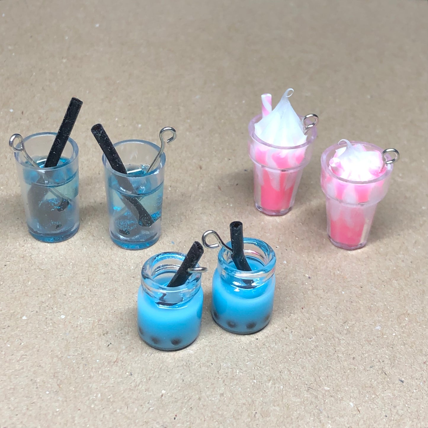 Six pink and blue ice cream sundae drink pendants