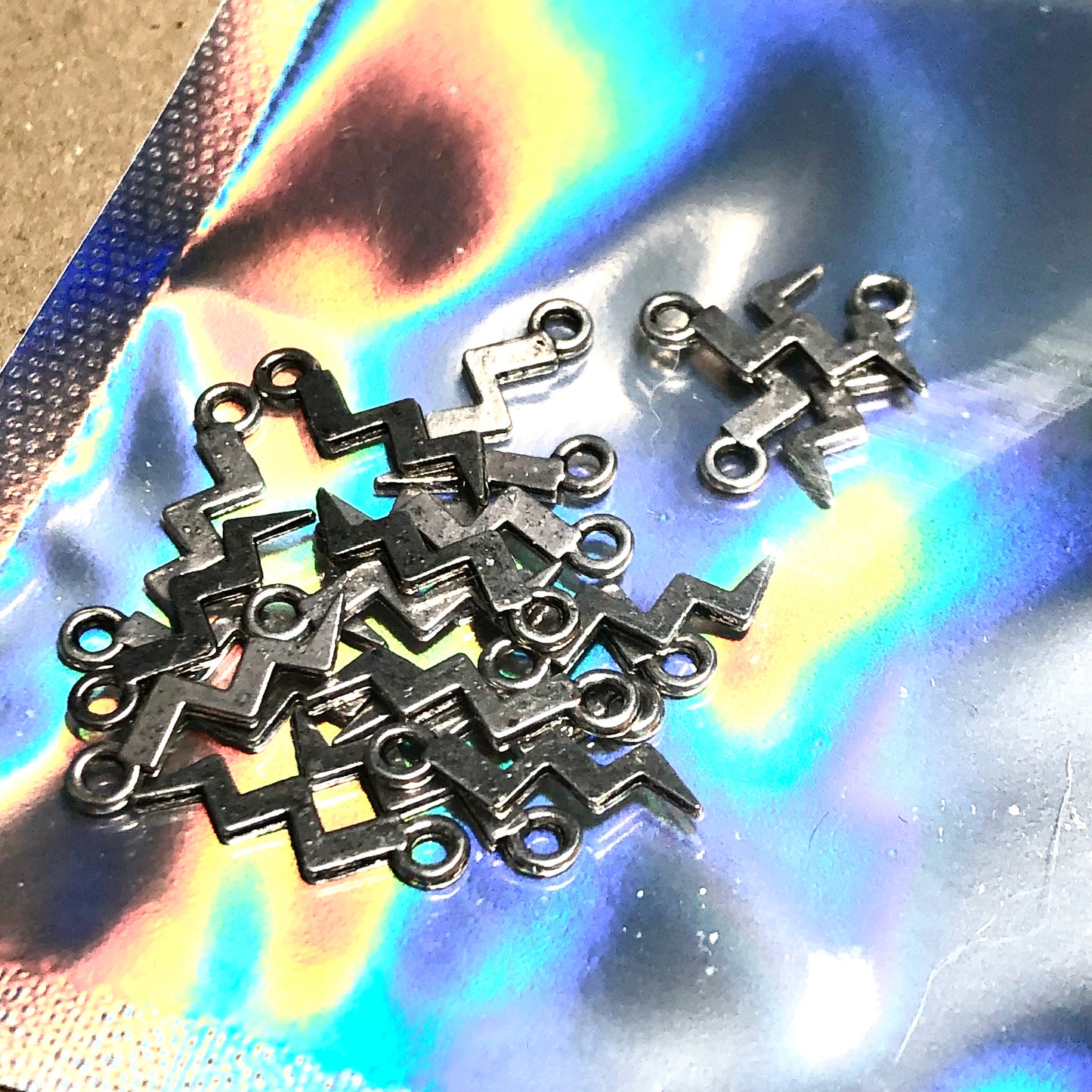 Twenty lightning bolt charms