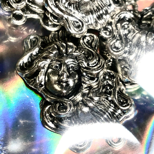 Twelve goddess head connector charms