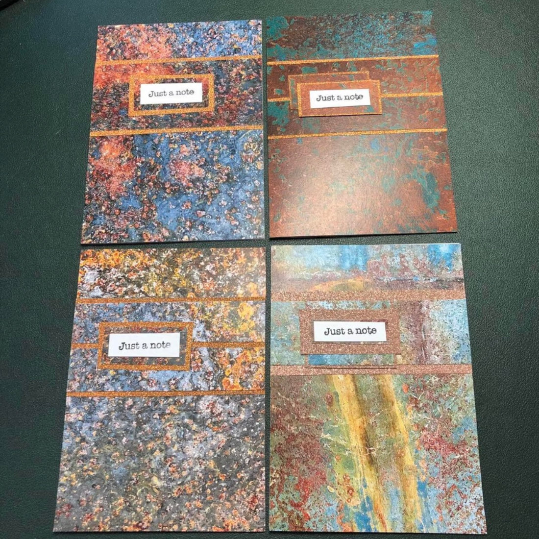 Four unique rust design handmade cards