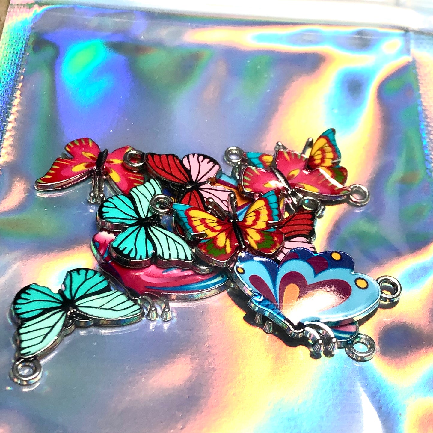 Twelve colourful butterfly charms