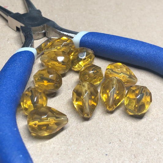 Yellow faceted teardrop shaped glass beads