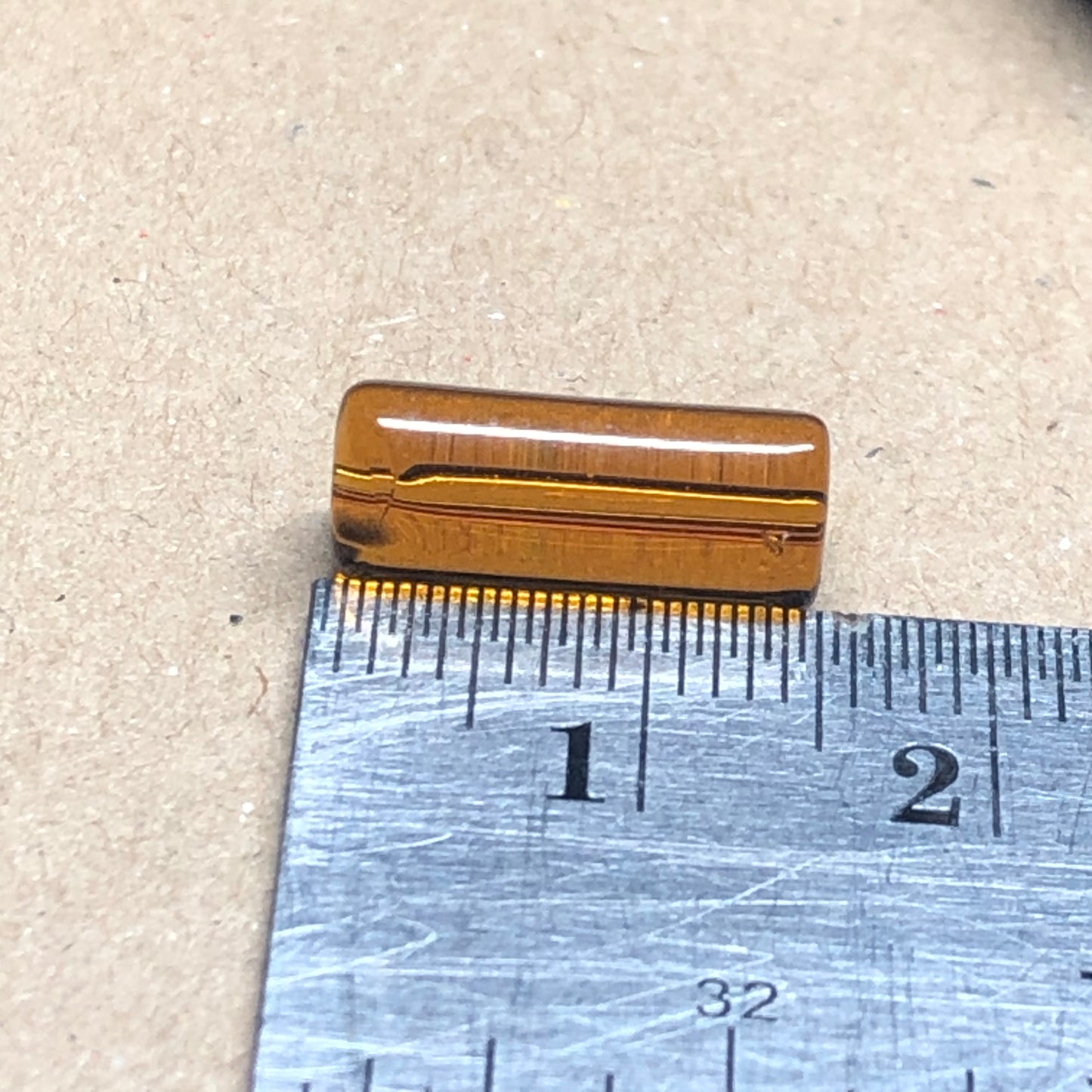 Brown glass tube beads