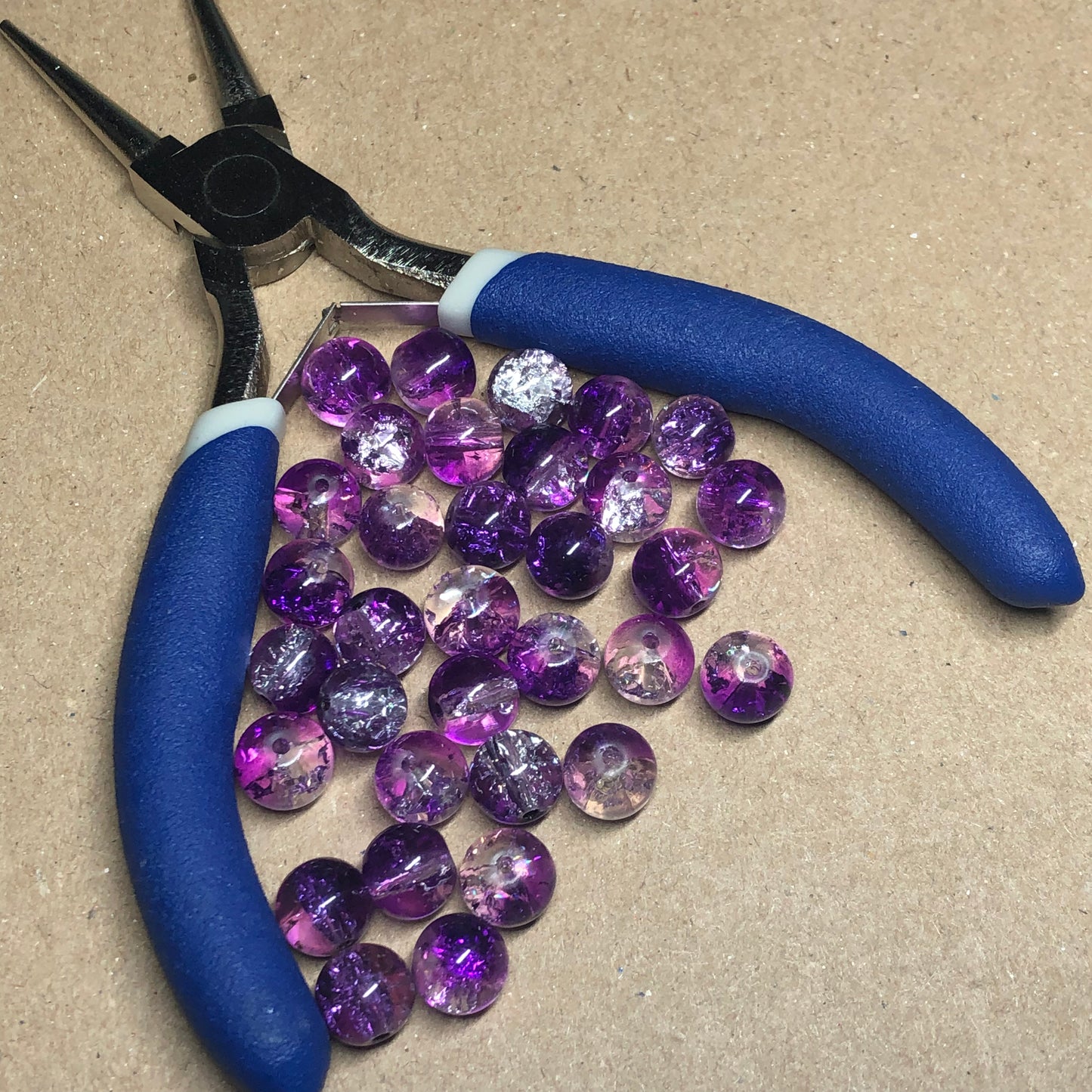 Purple and clear crackle glass beads