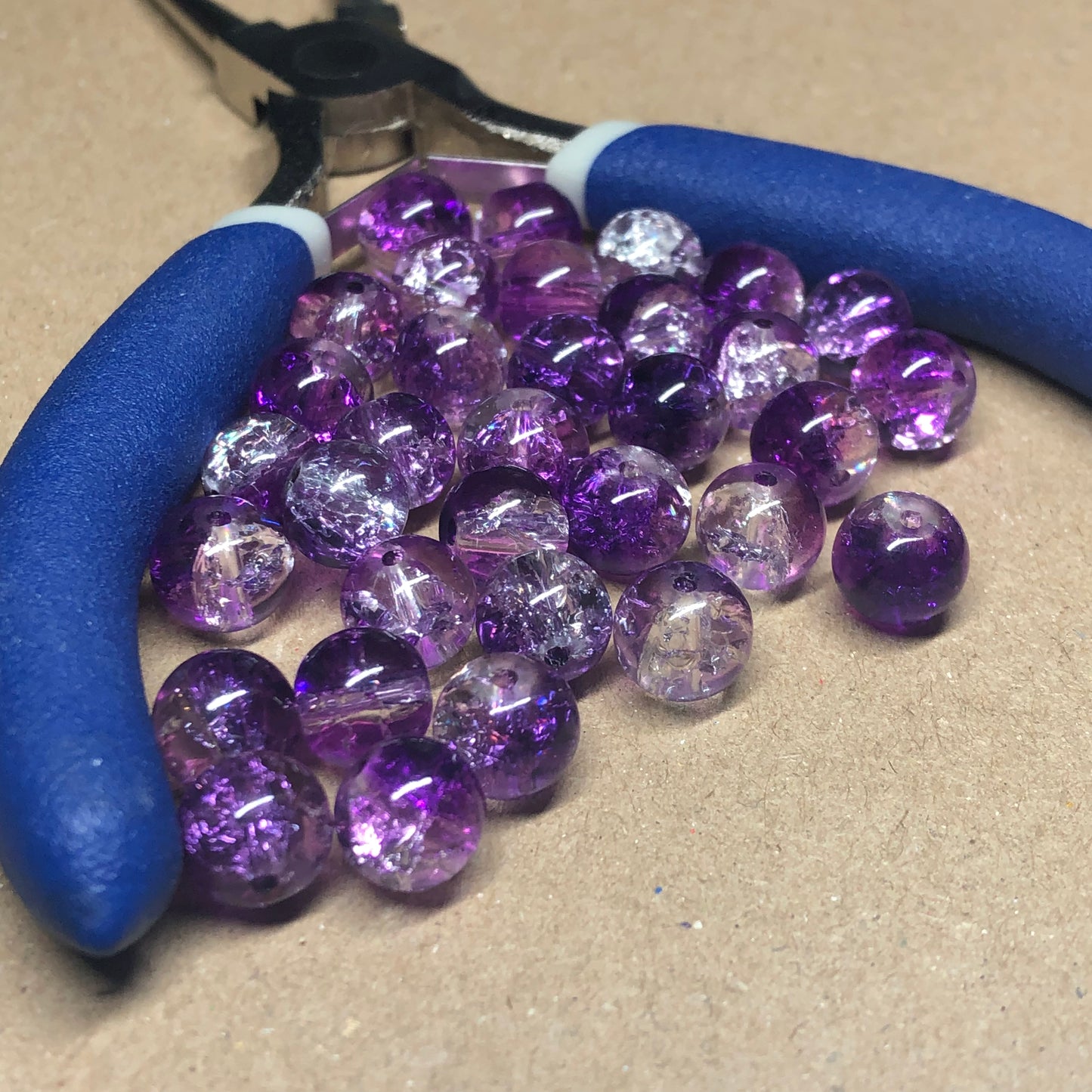 Purple and clear crackle glass beads