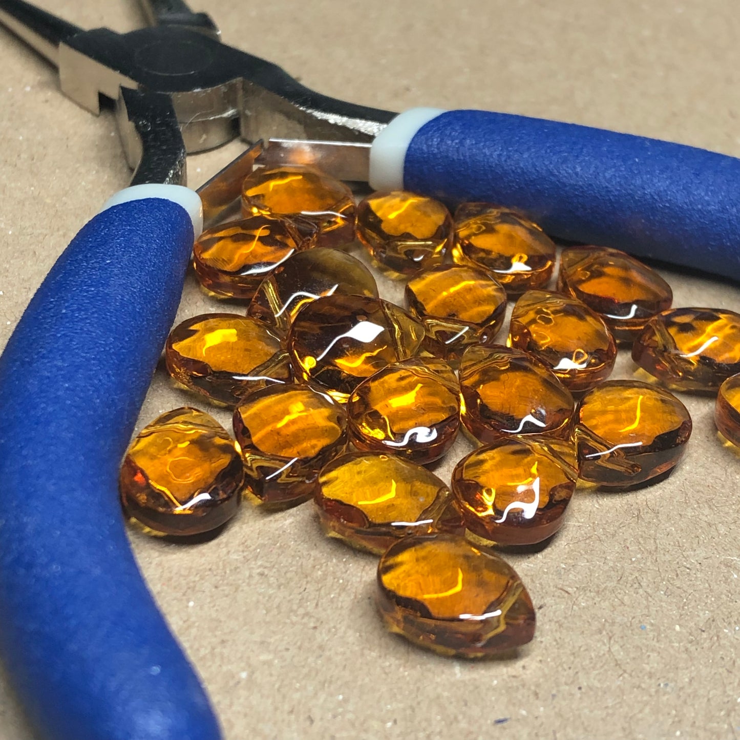 Golden syrup teardrop shaped glass beads