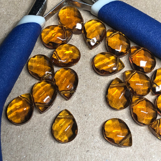 Golden syrup teardrop shaped glass beads