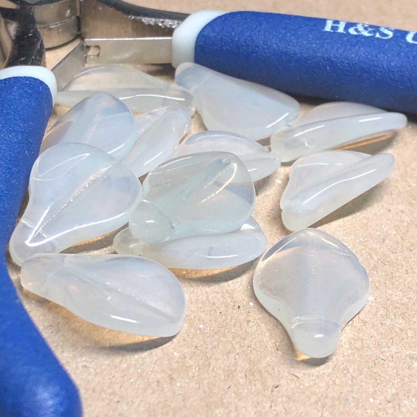 White opaque glass leaf beads