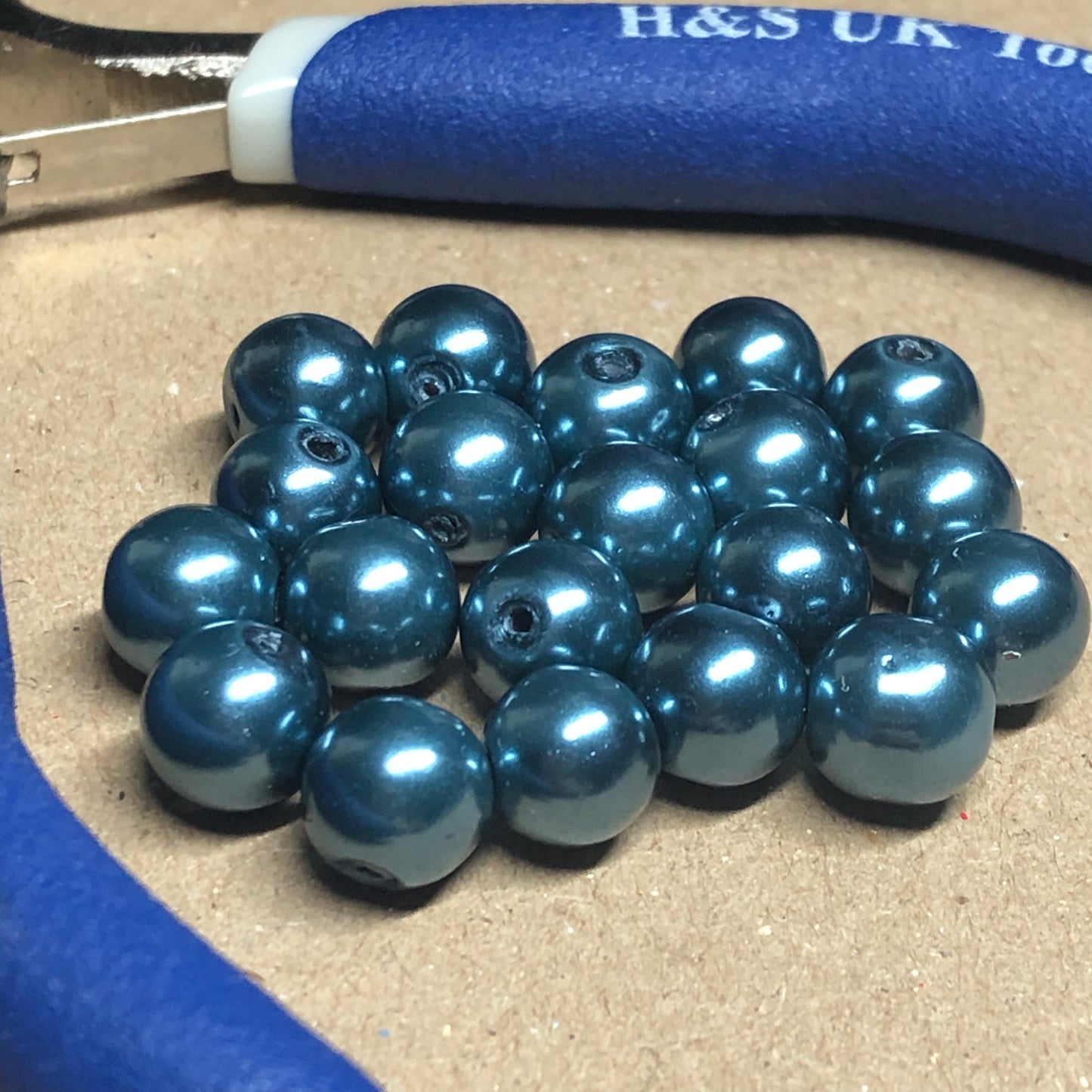 Teal blue painted magnetic beads