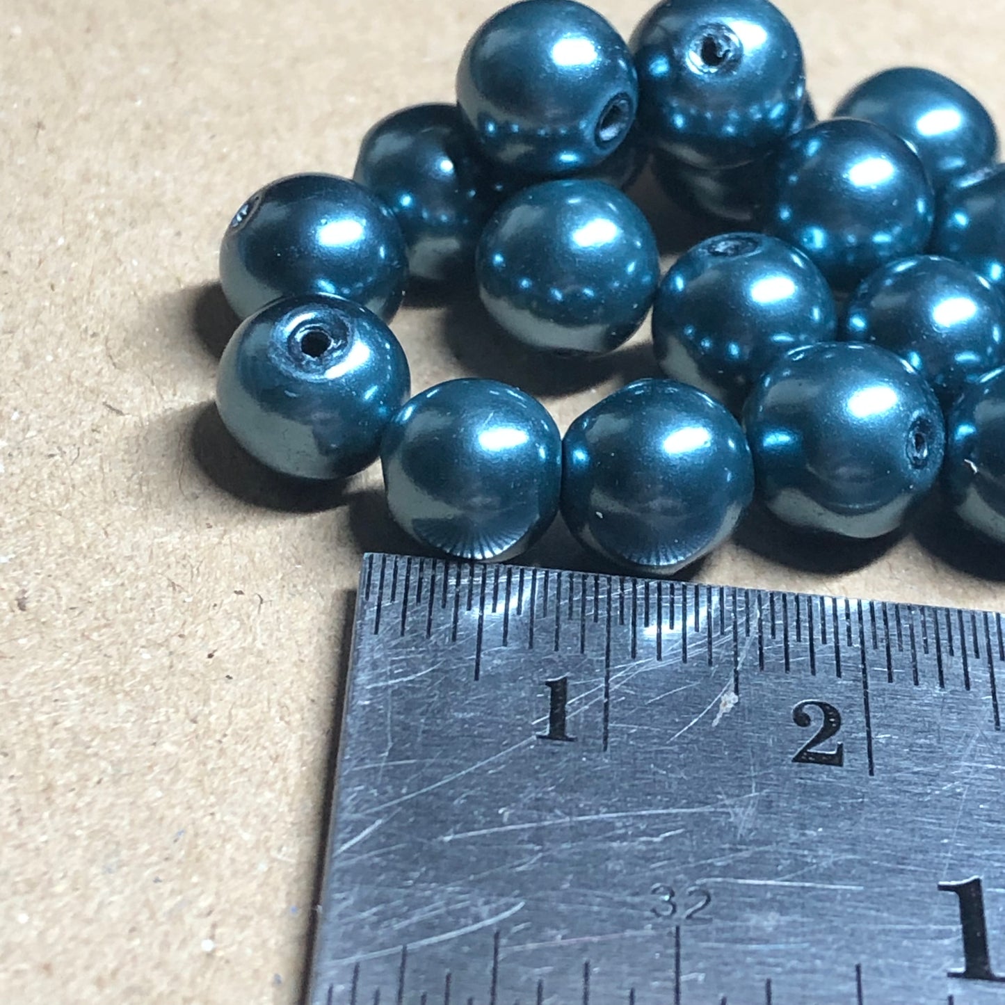 Teal blue painted magnetic beads