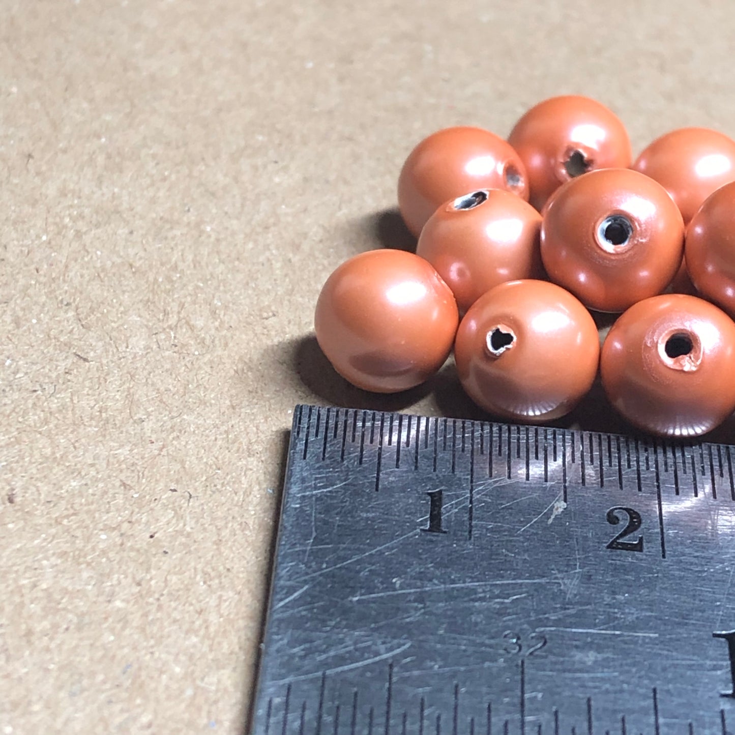 Peach painted magnetic beads