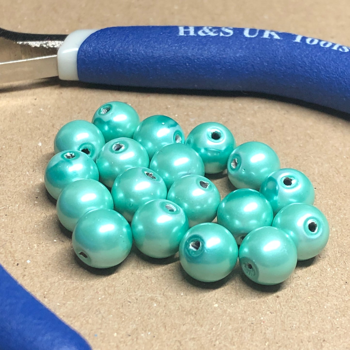 Mint green painted magnetic beads