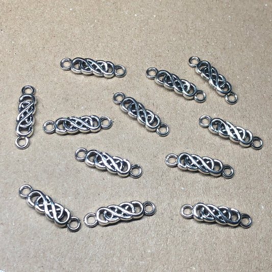 Twelve Celtic knot braid charms