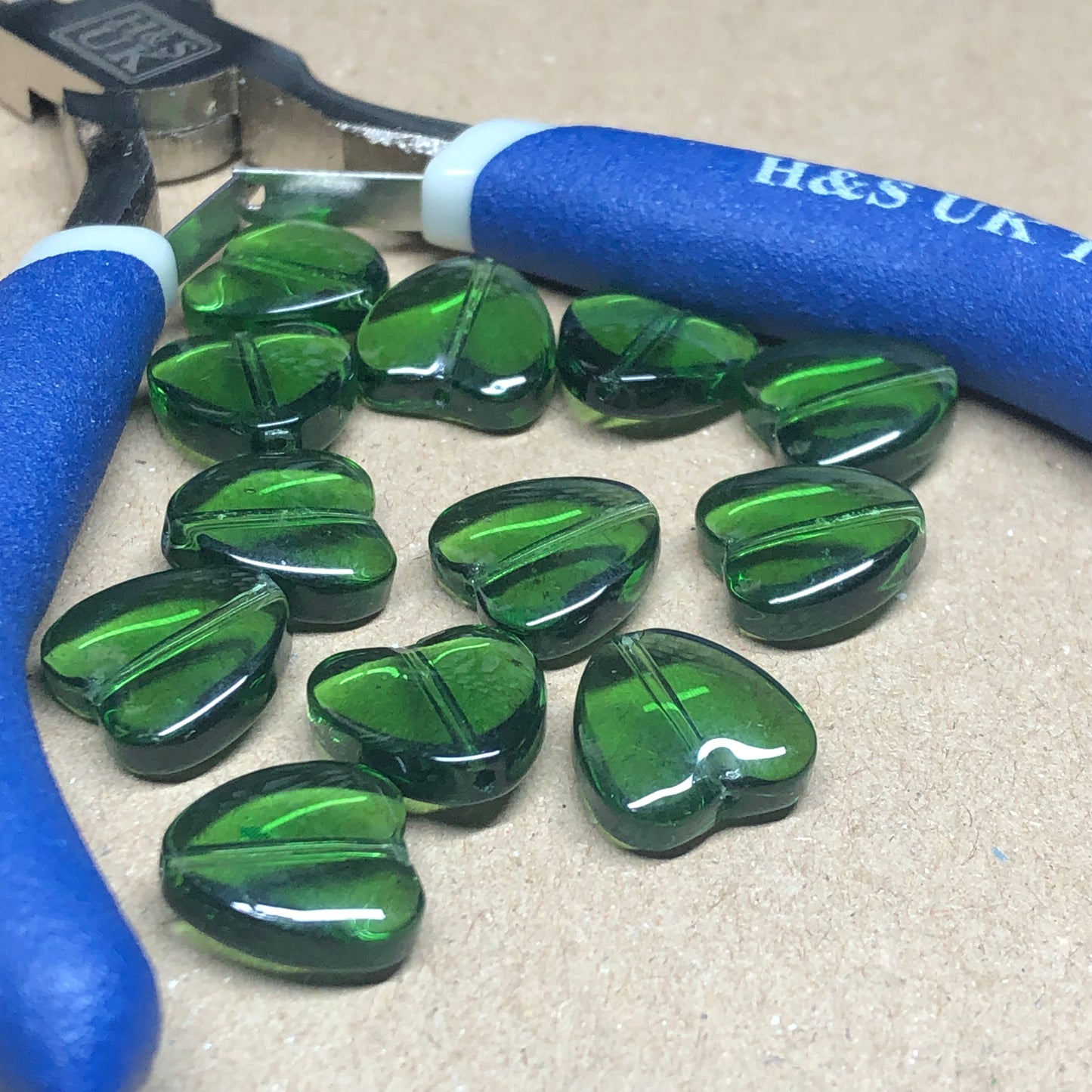 Green glass heart beads