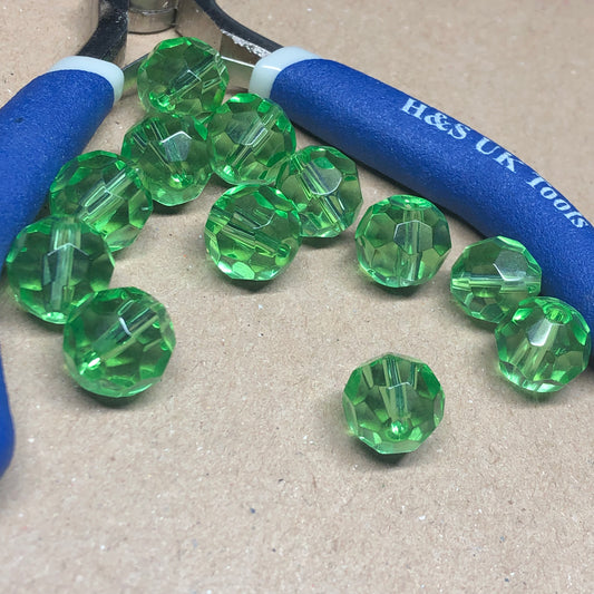 Green round faceted glass beads