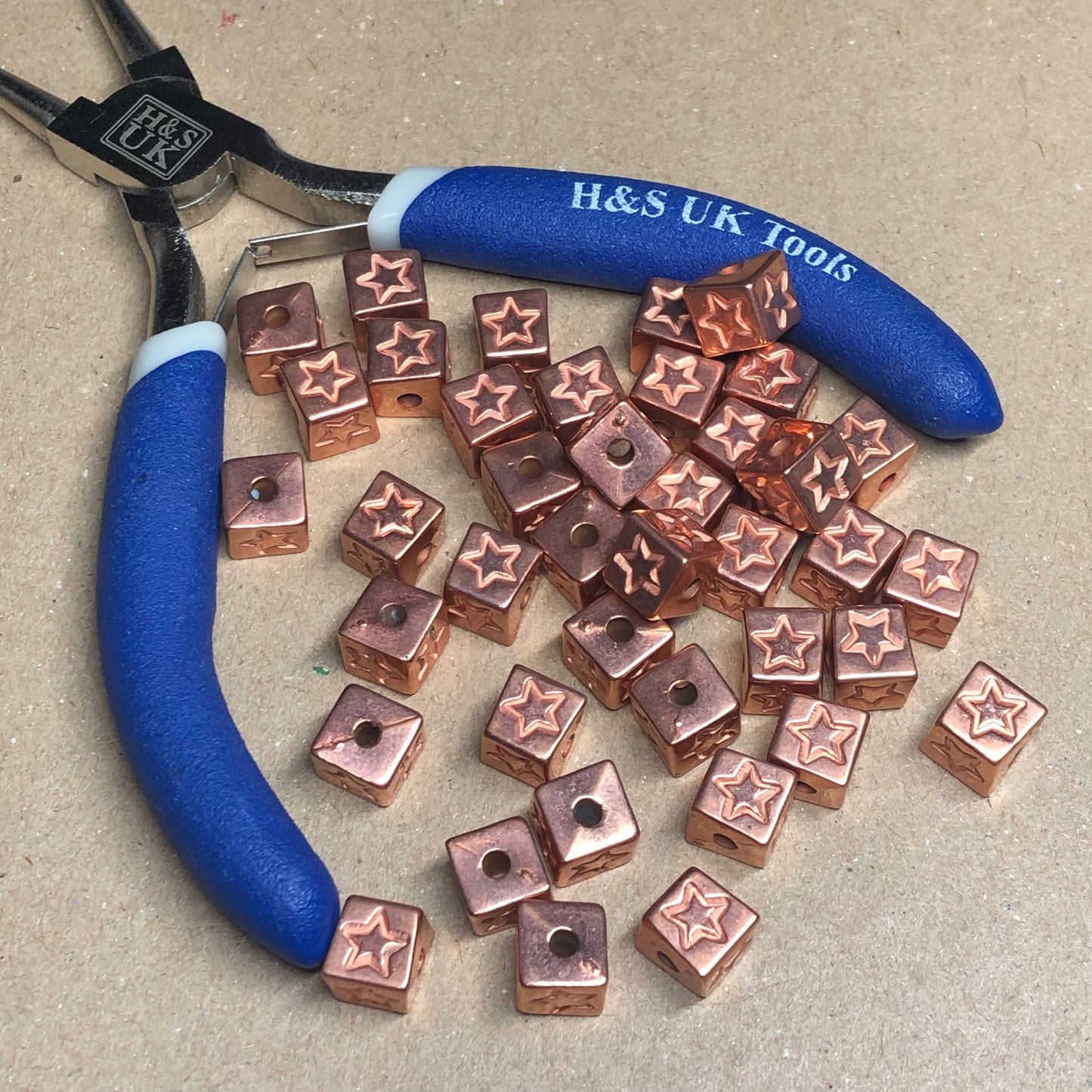 Copper star cube charms